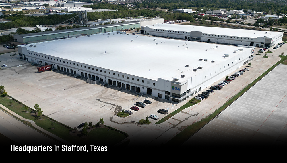 A large white industrial building based in Stafford Texas (Houston).